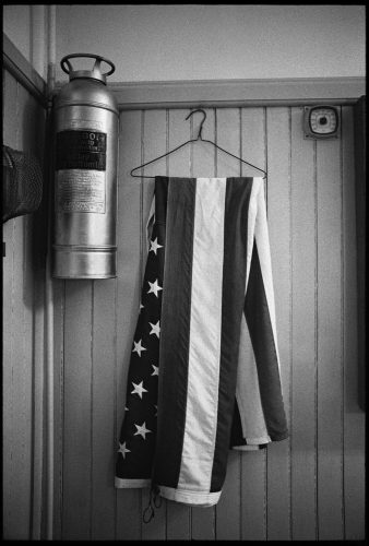 Flag on a Hanger, a photograph by Brian Lanker
