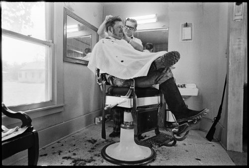 Small Town Barber, a photograph by Brian Lanker